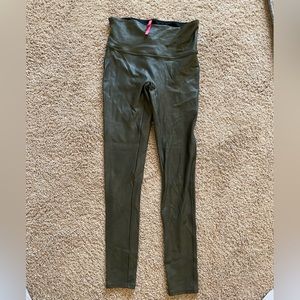 SPANX Faux leather olive color leggings.